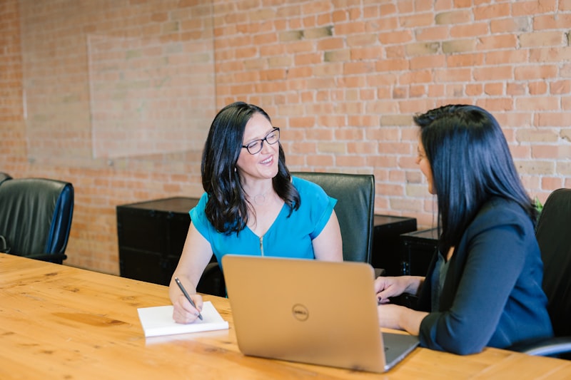 Stock photograph: someone presenting to colleagues in an office